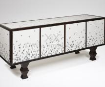 A pinewood sideboard veneered with a mosaic of ceramic