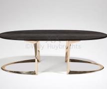 A polished and varnished bronze coffee table