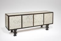 A pinewood sideboard veneered with a mosaic of white and gold earthenware
