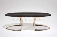 A polished and varnished bronze coffee table